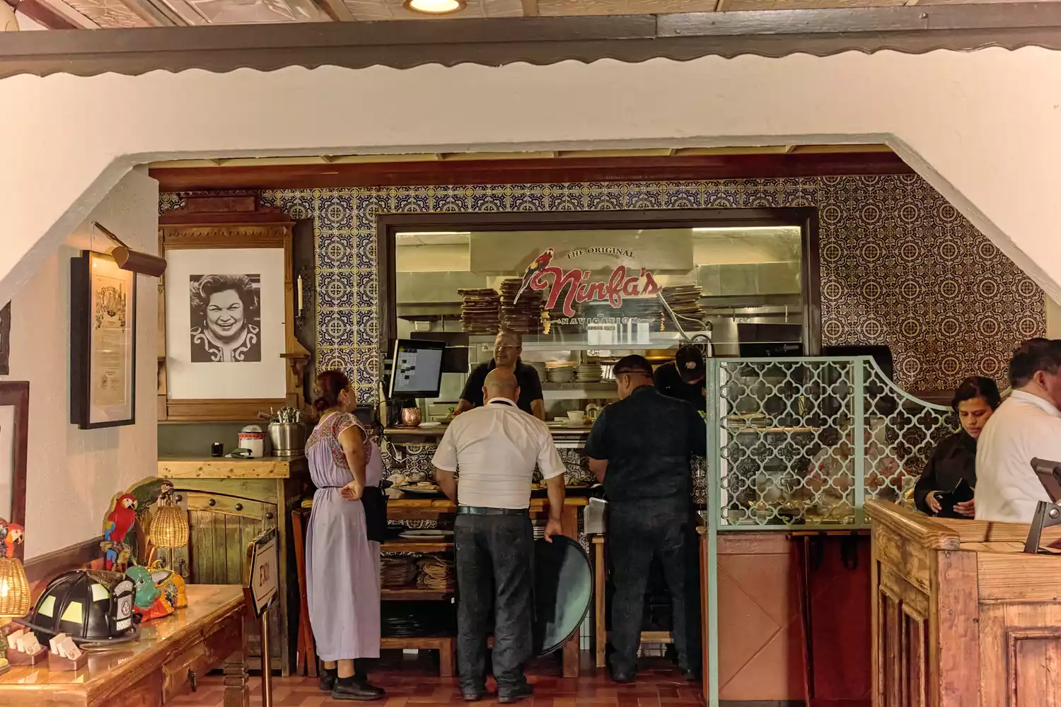 The busy service window inside the Original Ninfa’s on Navigation.