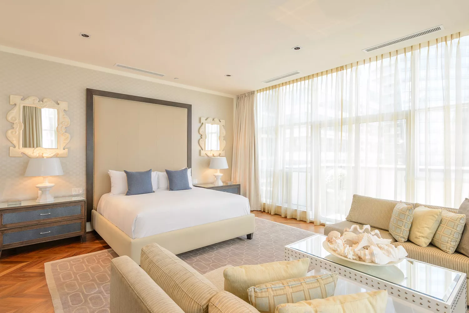 Modern guest room at The Loden with warm wood accents and contemporary lighting.