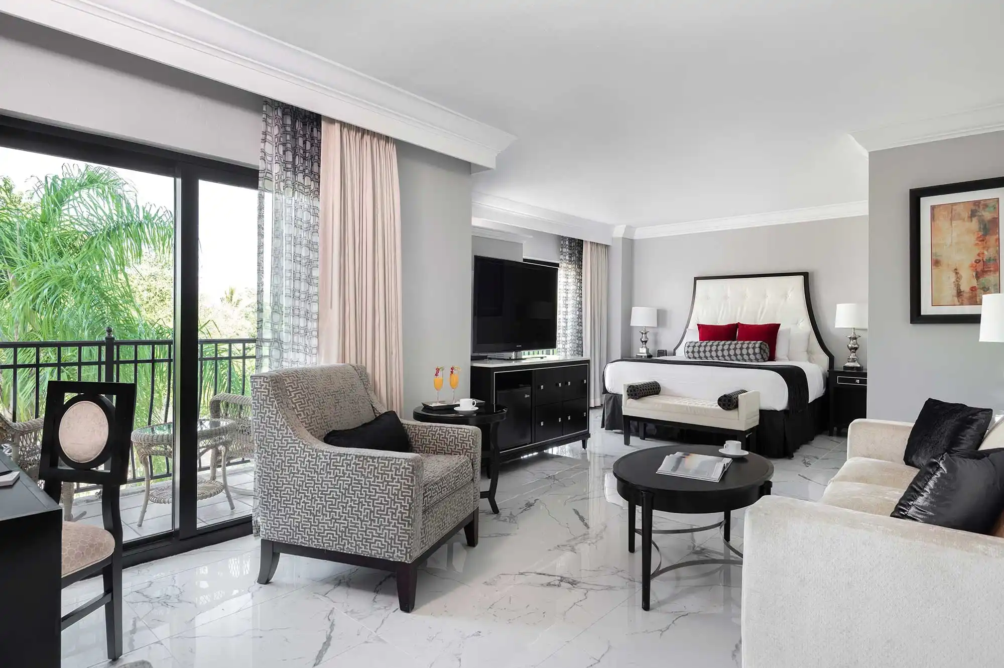 Luxury decor and bedroom set-up of the Royal Suite at the Inn on Fifth Club Level