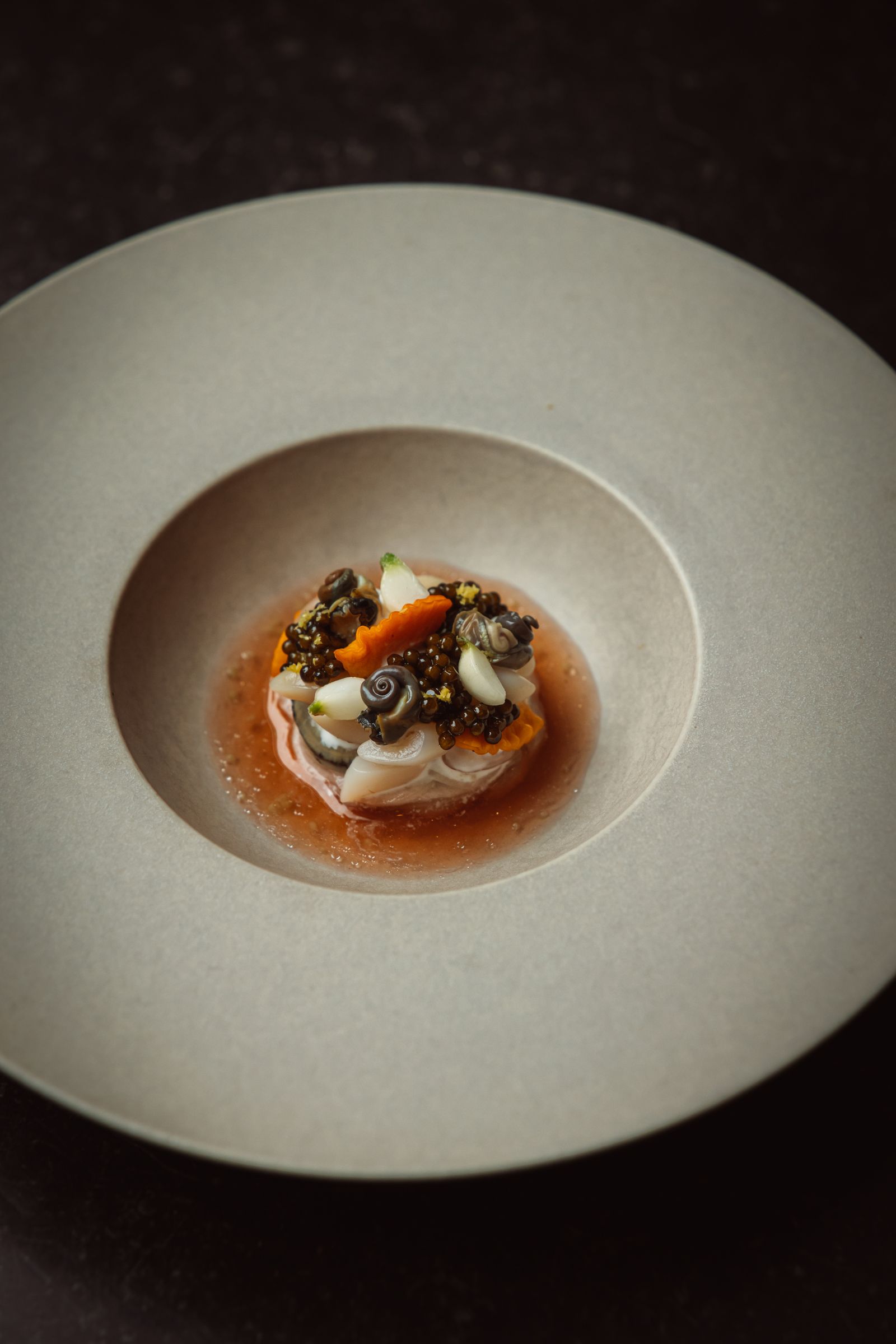 A beautifully presented gourmet dish on a plate.