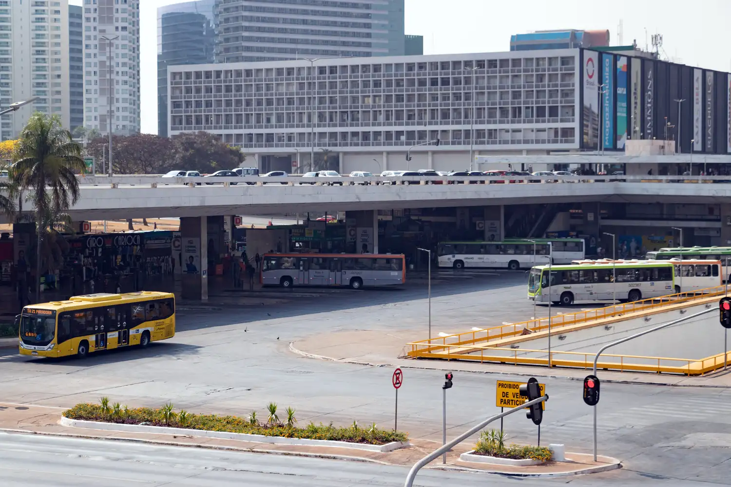 The main interstate bus terminal in Brasília with several buses at the docks.