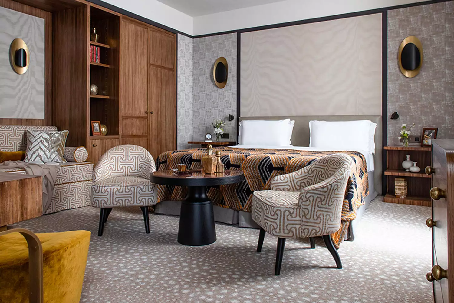Intimate and stylishly decorated guest room at Esprit Saint Germain.