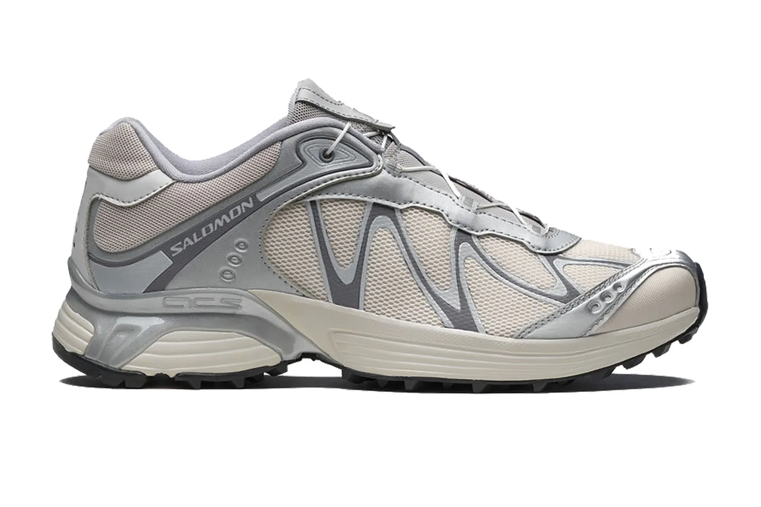 Three-quarter view of the Salomon XT-WHISPER highlighting the Quicklace system.