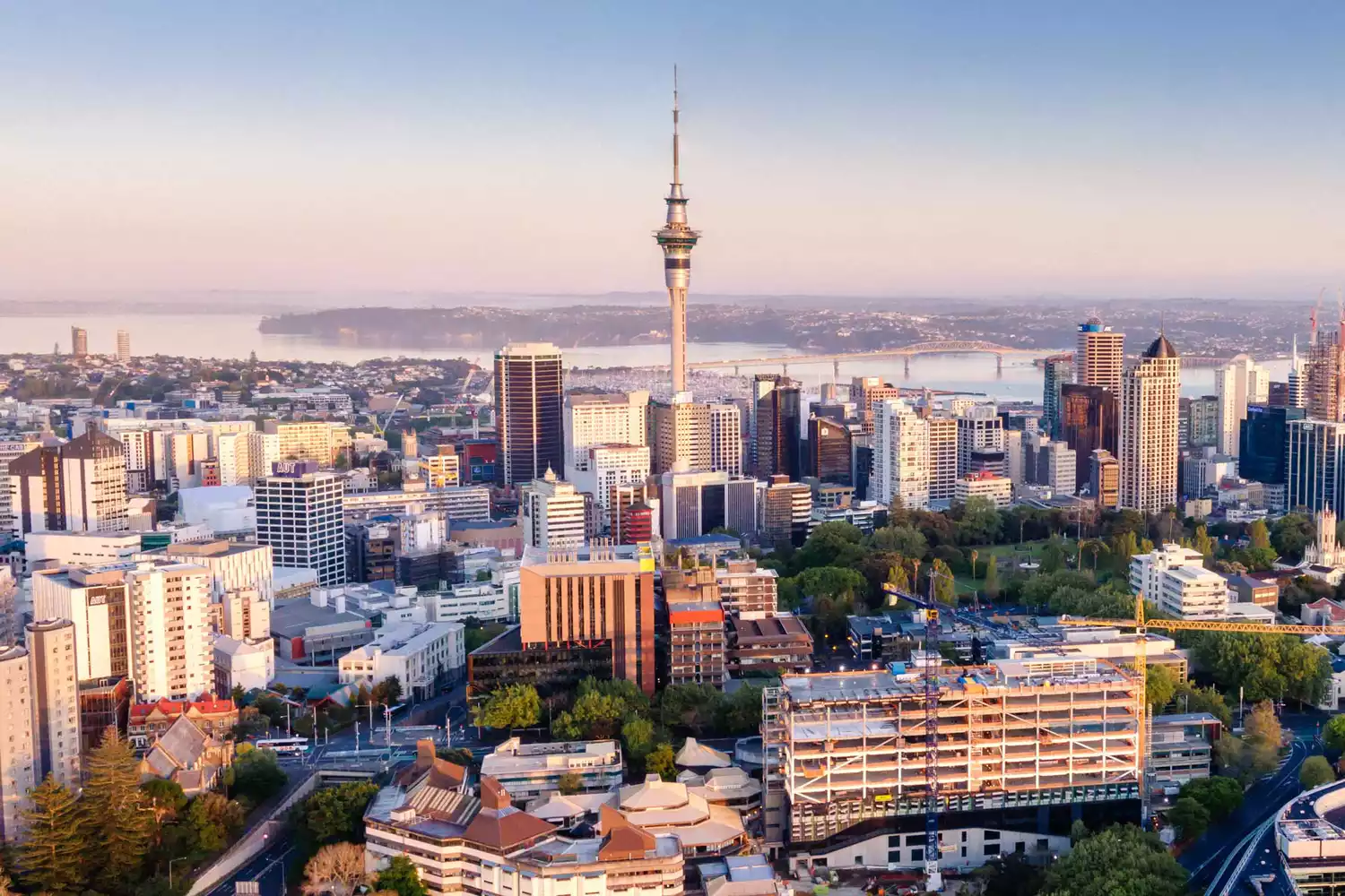 Aerial shot of the Auckland skyline and surrounding harbor.
