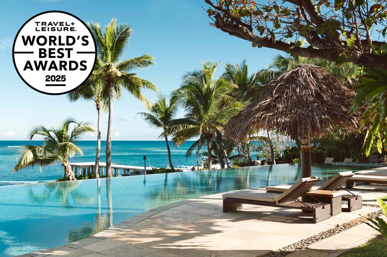 A panoramic featured image showcasing the turquoise waters and luxury amenities of a top-tier South Pacific resort.