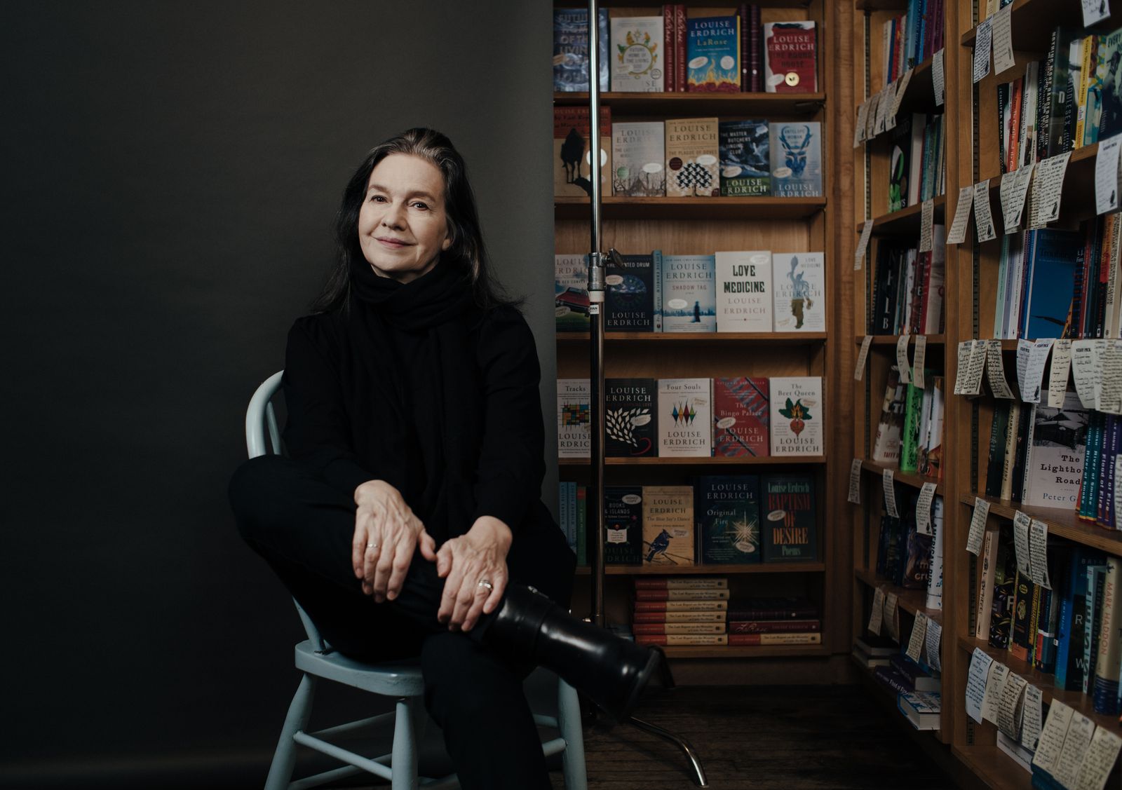 Portrait of author Louise Erdrich seated in an indoor setting.