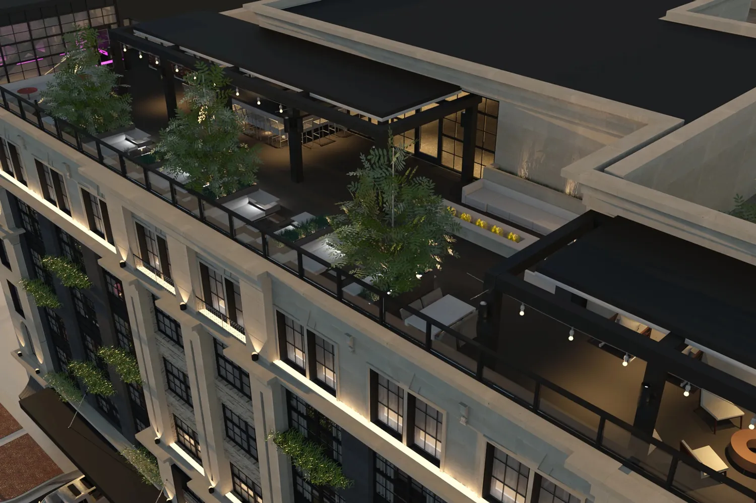 A modern rooftop terrace with comfortable seating and greenery overlooking the city at 106 Jefferson Hotel.