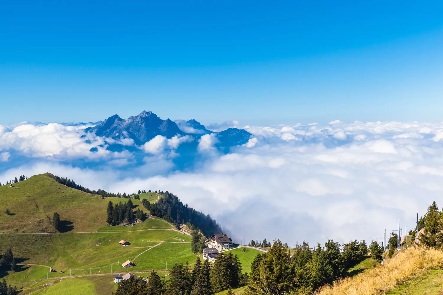 Aerial view of Mount Pilatus rising above a sea of clouds near Lucerne.